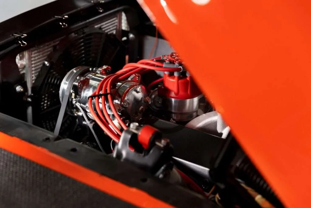 Certified technician replacing the battery of a Lamborghini with precision and care