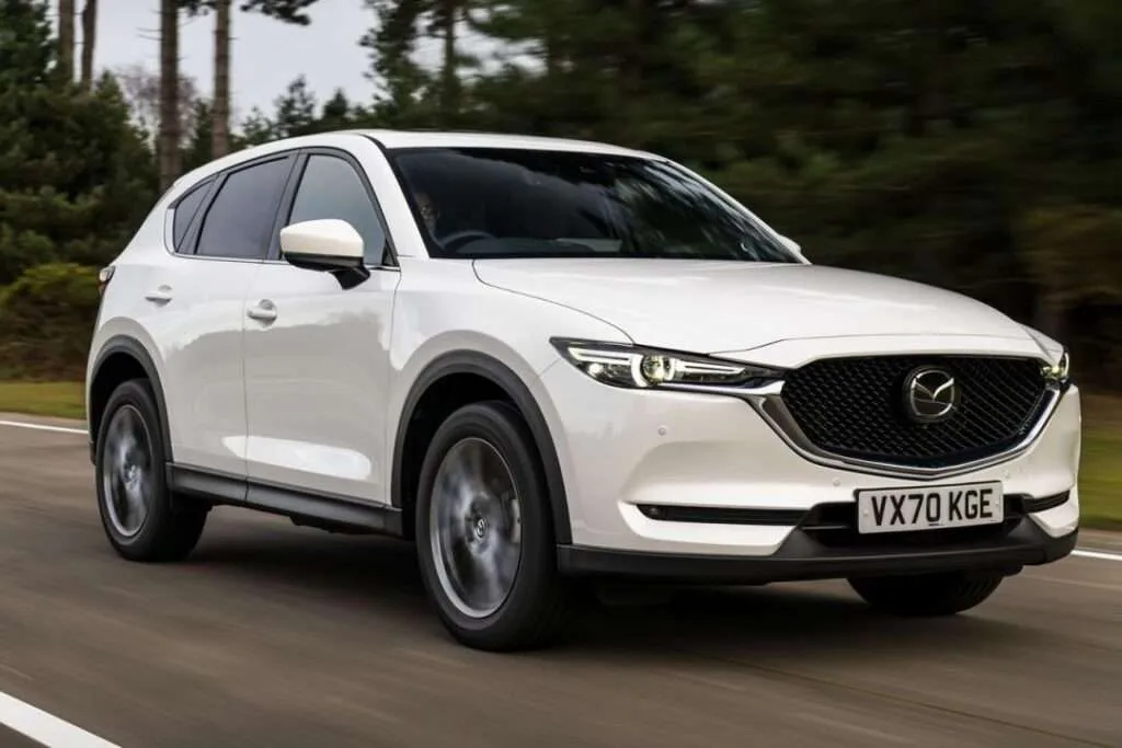 Mazda car cruising smoothly, powered by a well-maintained battery system
