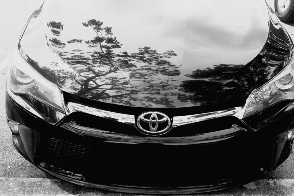 New battery installed in Toyota car during replacement service