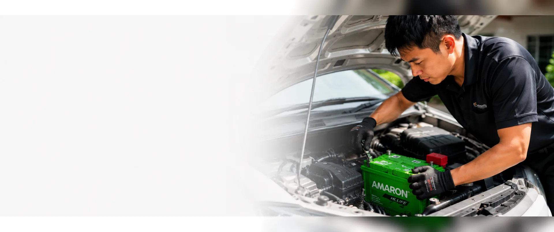 Professional technician installing a new Amaron car battery for a customer in Kuala Lumpur and Petaling Jaya.